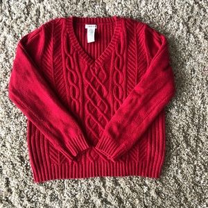 Red V-neck with red metalic thread detail.